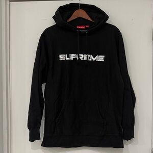 Supreme World Famous Black Hoodie with Bold Silver Logo